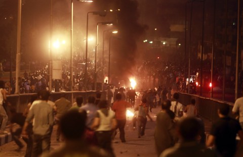 Deadly clashes erupt between protesters and ruling military junta in Cairo