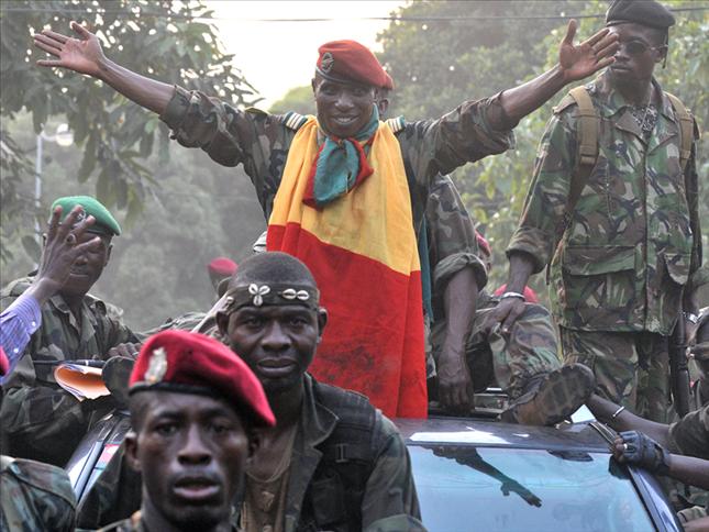 Guinea troops kill scores of demonstrators