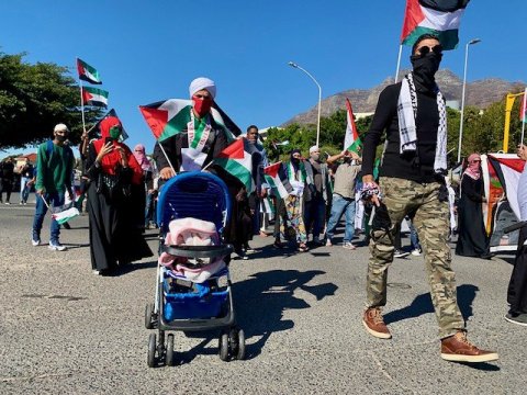 Hundreds march to Parliament to protest against Israeli air strikes in Gaza Strip