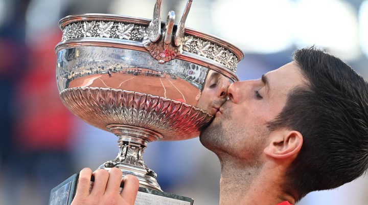 Novak Djokovic fights back to win second French Open title