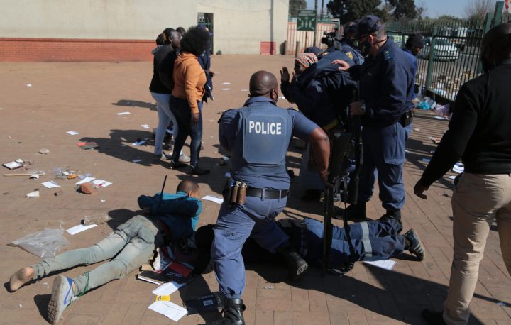 Looting suspects have their first day in court
