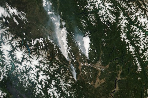 Wildfires rage across Canada’s gas heartland, shutting output