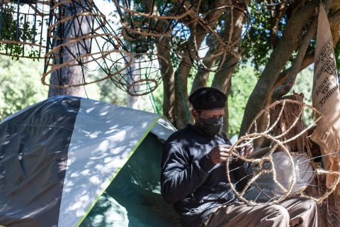 Homeless man illuminates innovation potential with recycled material lampshade creations
