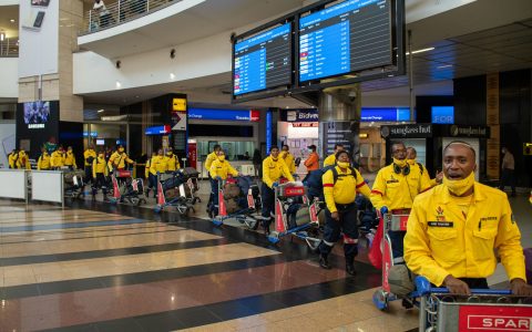 South African firefighters return home after helping to battle wildland blazes in Canada