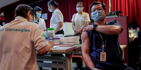 Singapore is making the unvaccinated pay for their Covid-19 medical expenses: Should South Africa do the same?