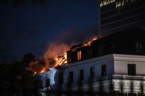 Suspect to appear in court, but fire again flares up at Parliament