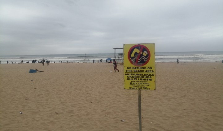 Beachgoers continue to swim despite warnings of severe contamination across Durban shores