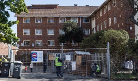 Residents of Cape Town’s Cissie Gool House left traumatised by police raid days after fire