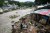 An informal settlement is devastated by flooding.