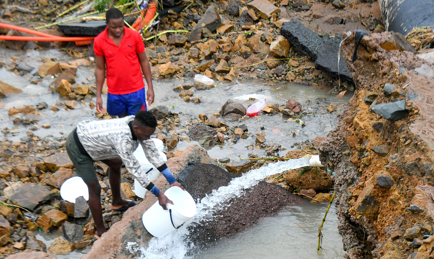 KZN floods - people collecting fresh water in Durban