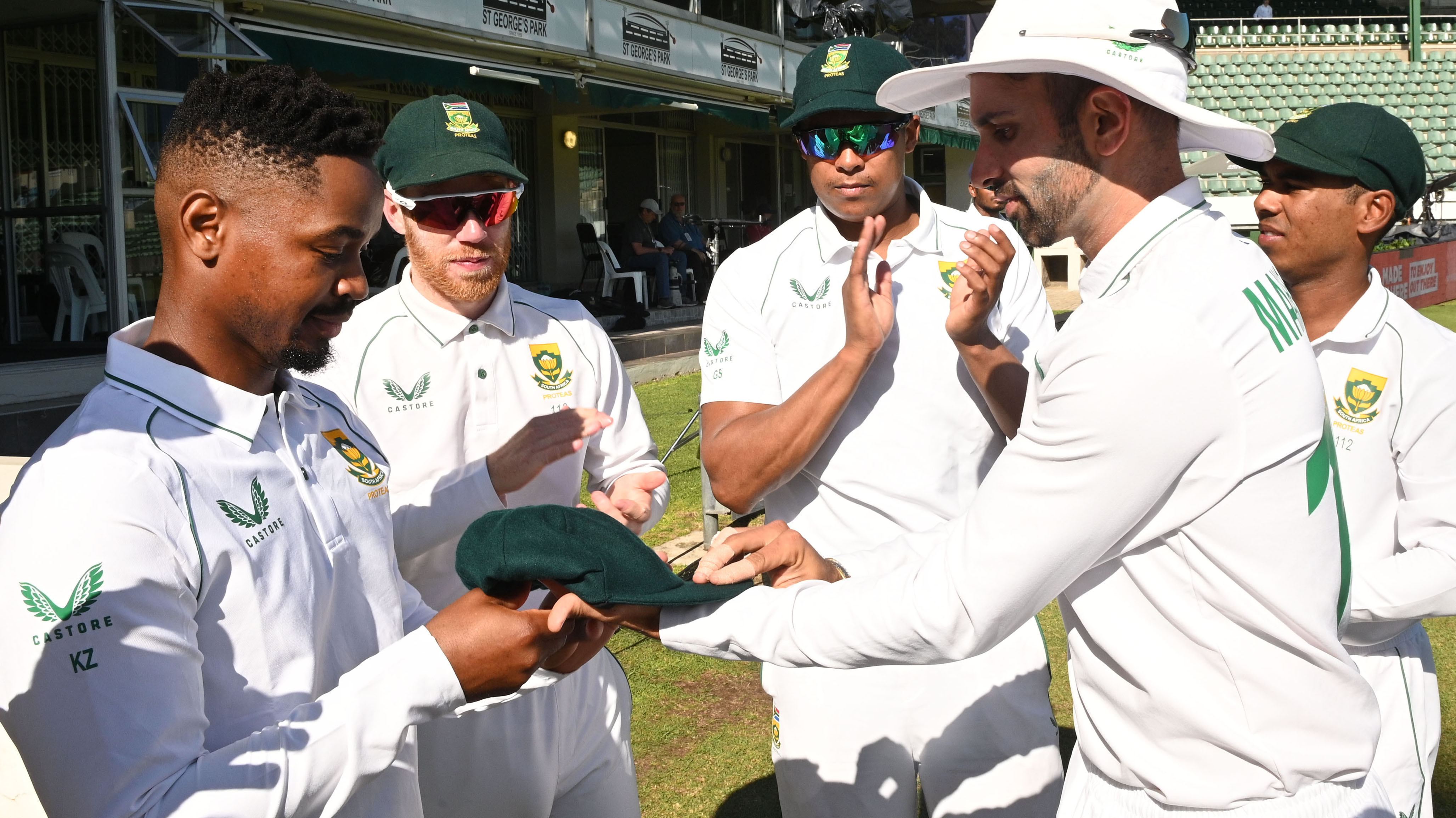 Khaya Zondo of the Proteas gets his cap from Keshav Maharaj of the Proteas during day 4 of the 2nd ICC WTC2 Betway Test match