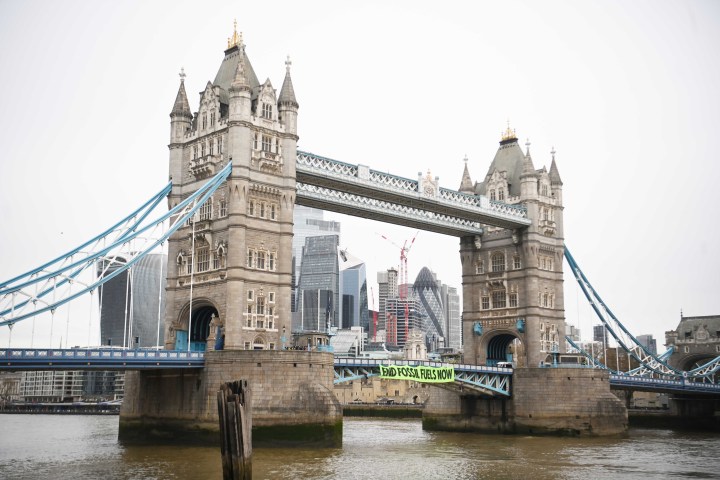 Climate change protesters block London’s Tower Bridge, vow more disruption