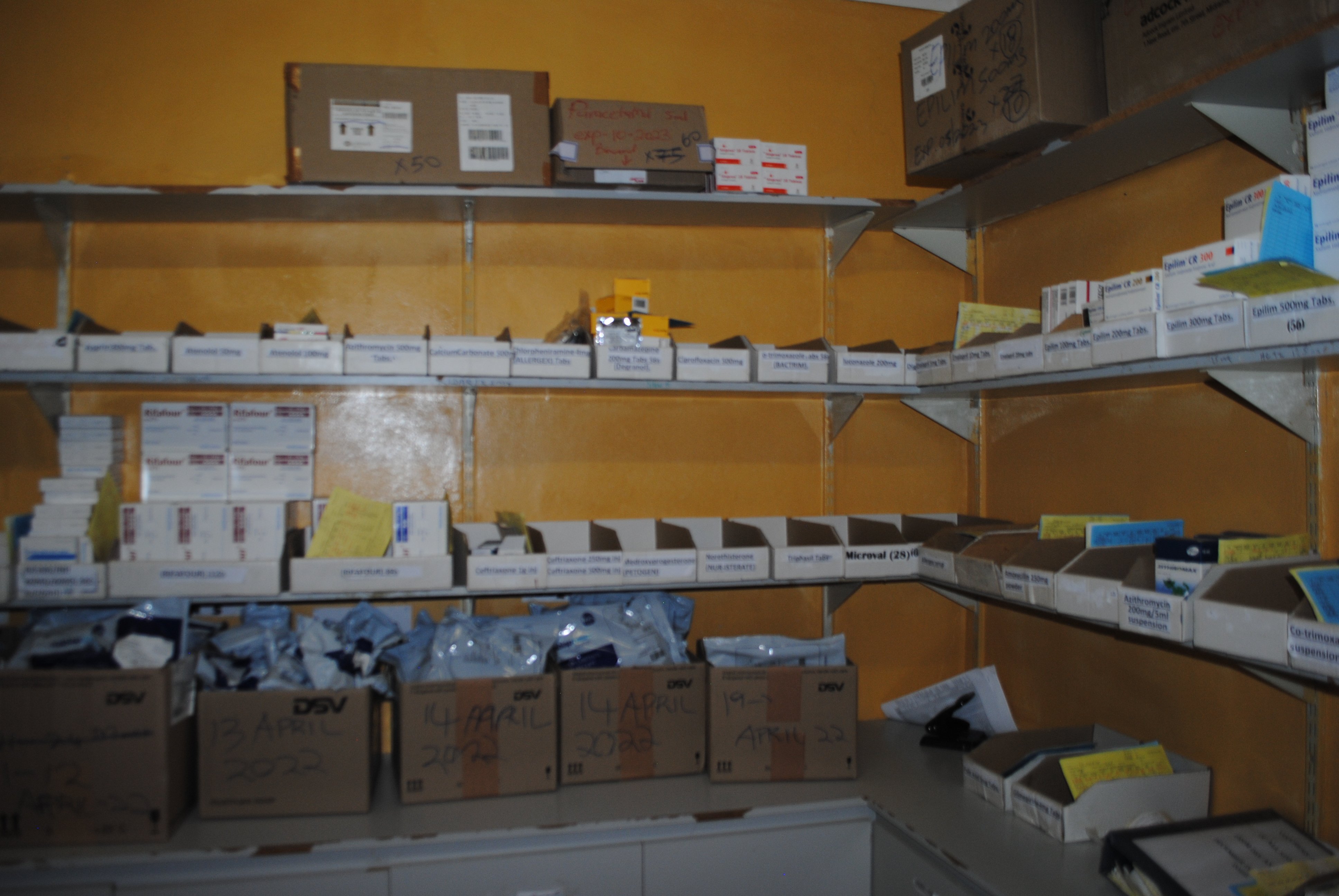 Empty boxes of chronic medication lie strewn across store room shelves at Thozamile Madakana clinic