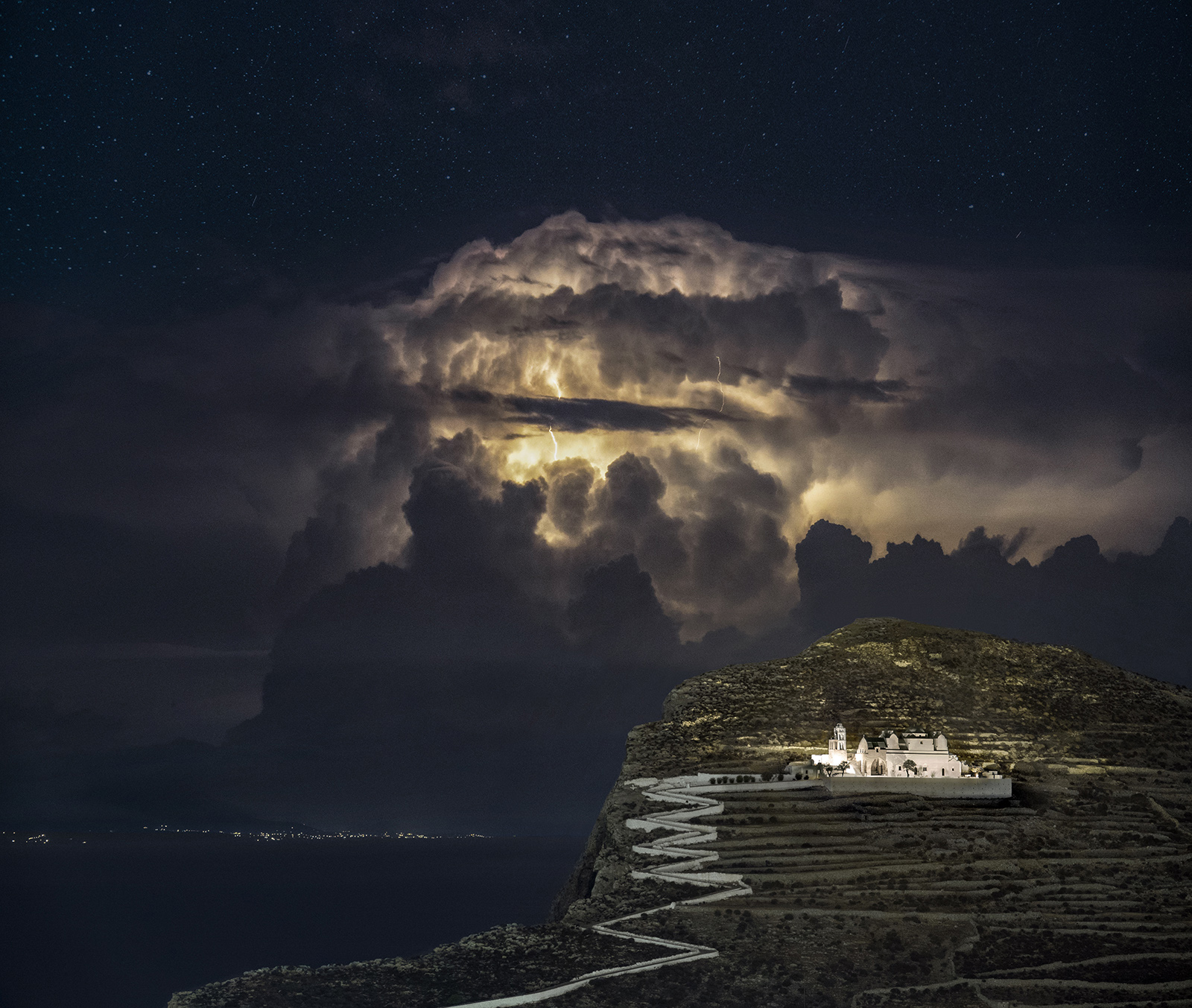 Violent midnight storms over the Aegean Sea, captured from a cliff above Chora on Folegandros island, in October 2021. 