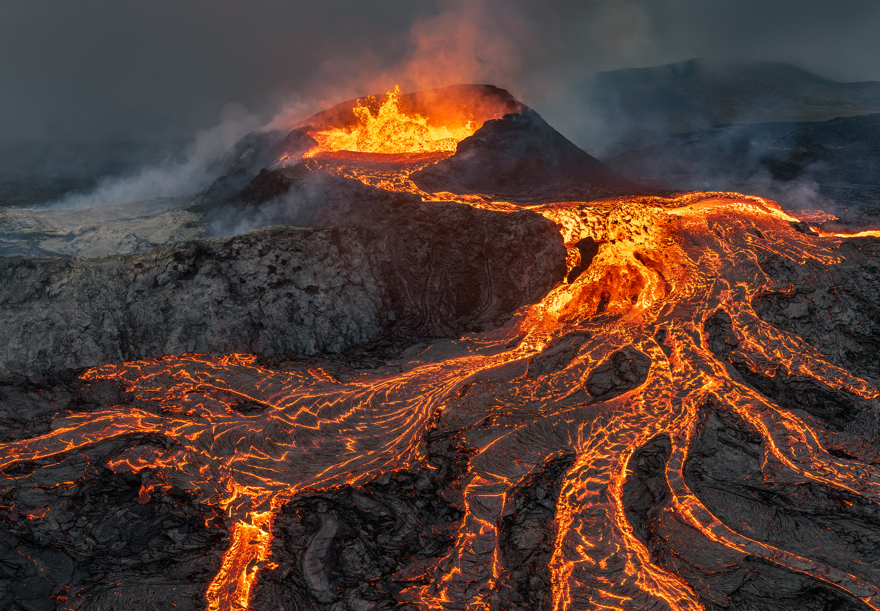 Magma rises directly from the mantle, driven by gigantic gas bubbles 10-15 metres in diameter, which burst at the surface. As a squall blanketed the Reykjanes peninsula with clouds and heavy rain, I ascended to the base of Geldingadalir, Iceland's youngest volcano.