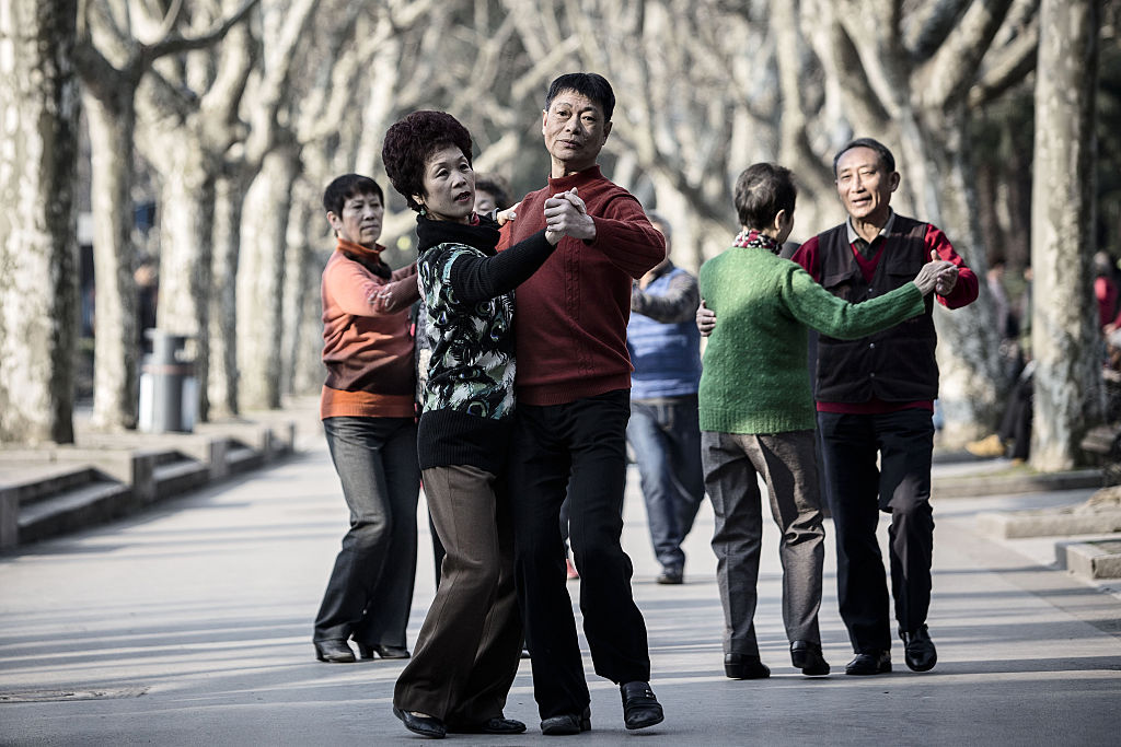 Couples dance at Fuxing Park in Shanghai, China, on Tuesday, Feb. 9, 2016.