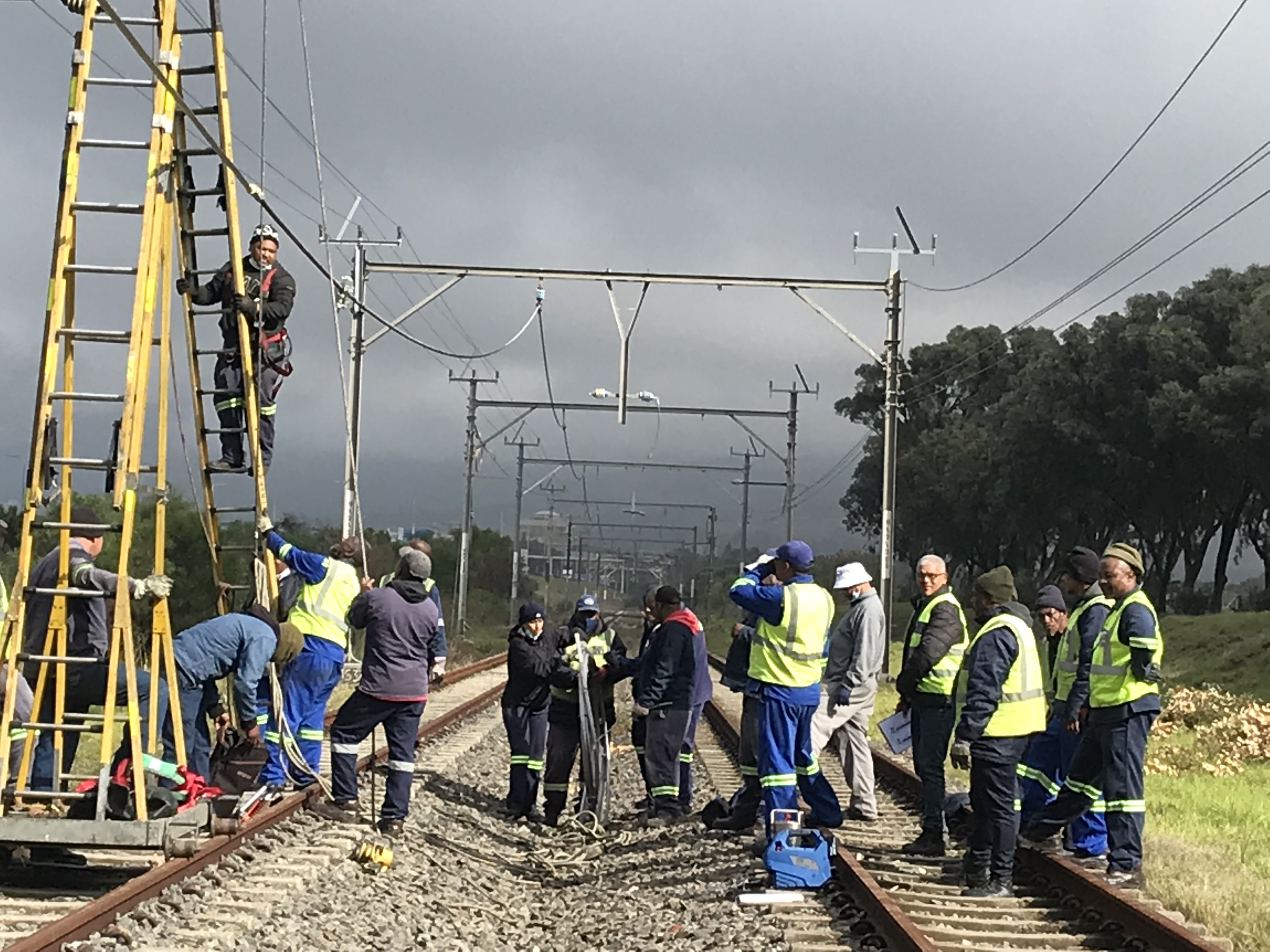 Workers repairing rail tracks on the Central Line in Cape Town