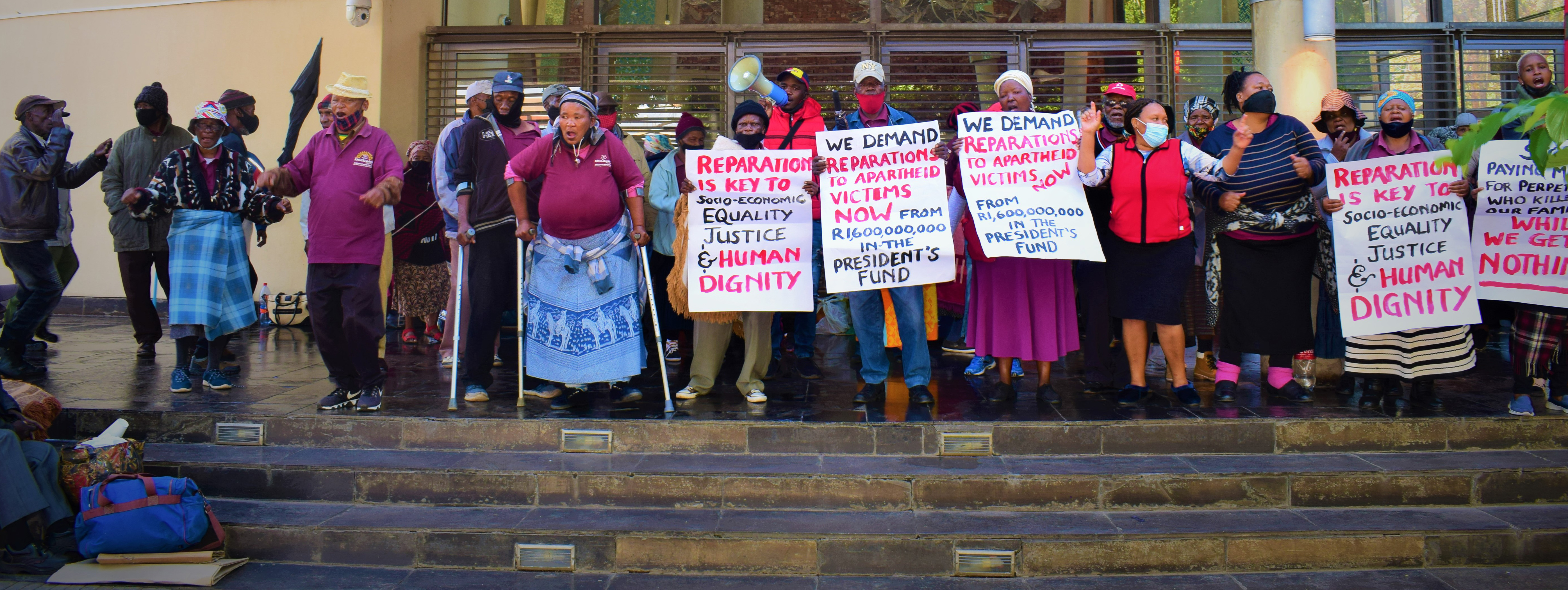  Khulumani Support Group members outside the Constitutional Court in Johannesburg