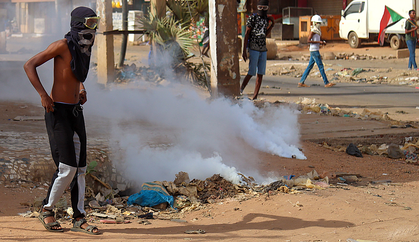Tear gas is fired at protesters by police in Sudan