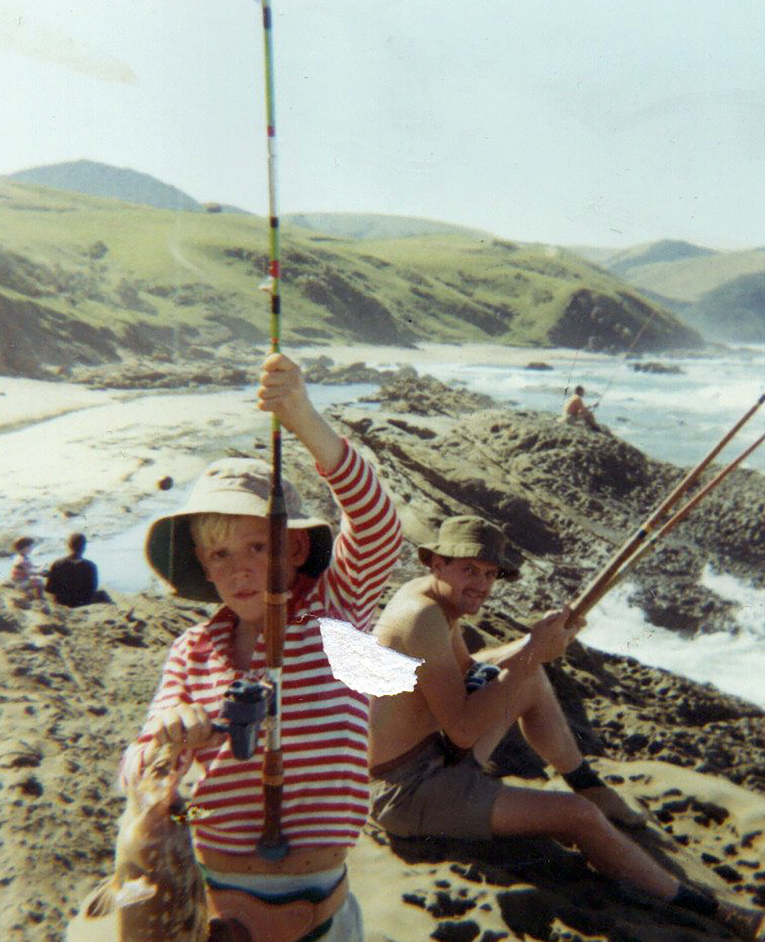 Hamilton Wende fishing on the beach with his father