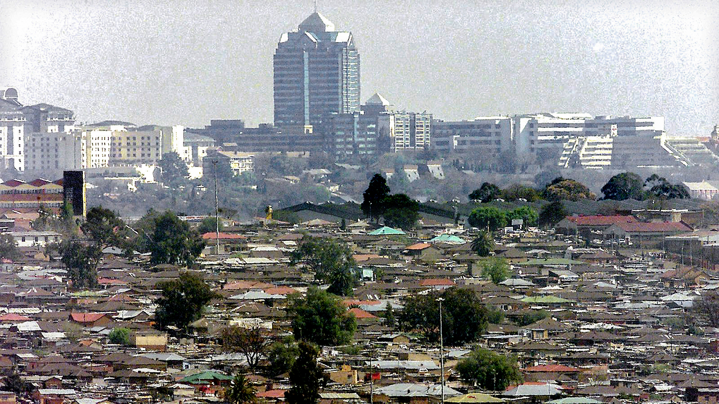 Alexandra township flanked by the far more affluent Sandton on the skyline