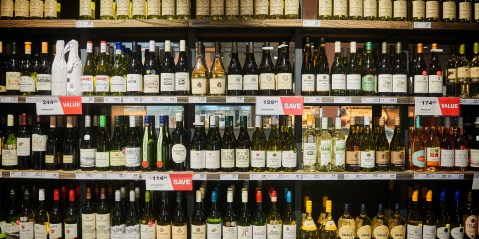 Retailers cash in as consumers drown their financial worries in alcohol