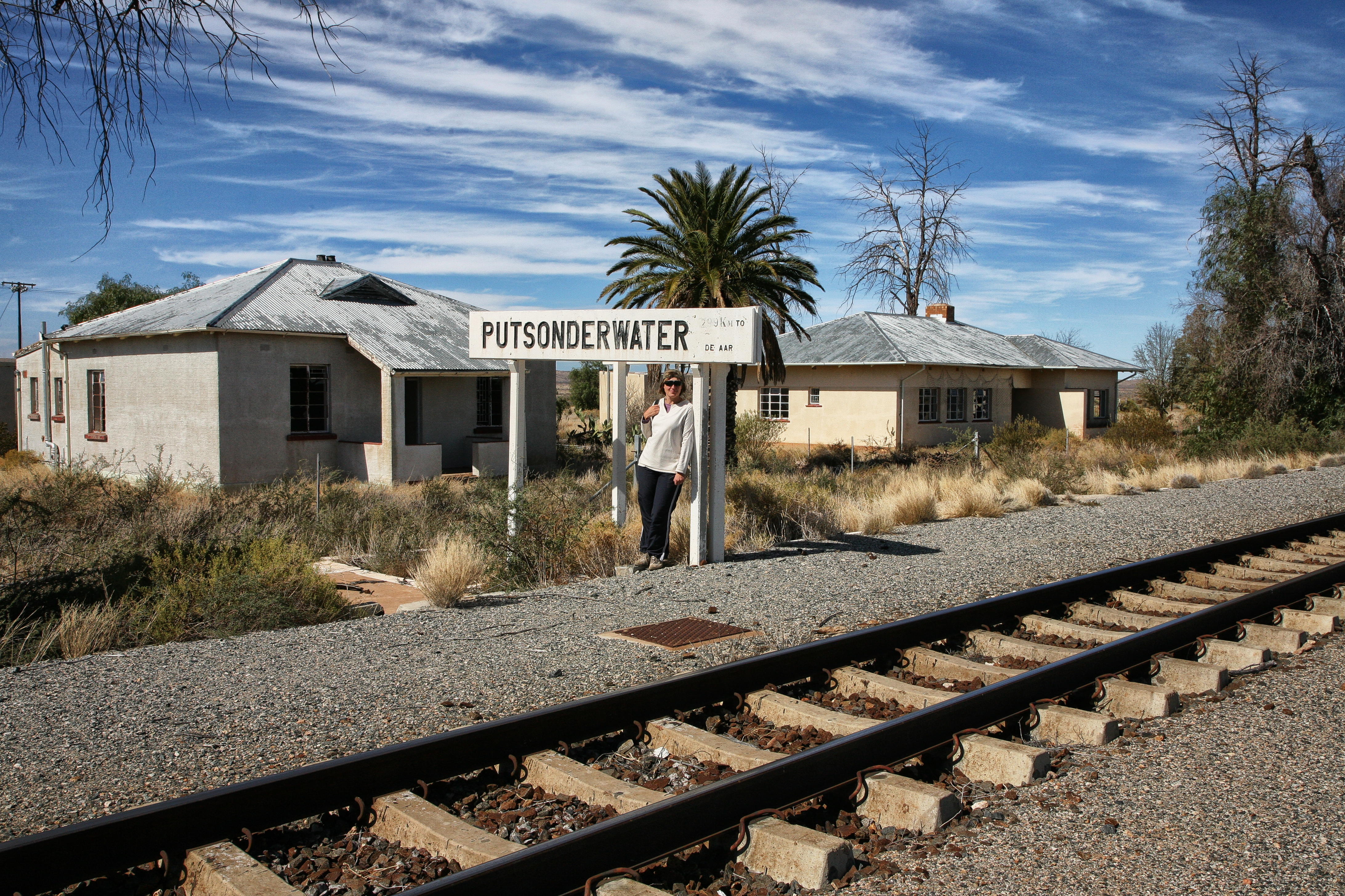 Posing at Putsonderwater – Julienne du Toit waits for a train that doesn’t stop here anymore.