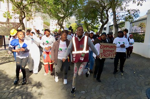 Mining-affected communities protest outside Parliament demanding greater development