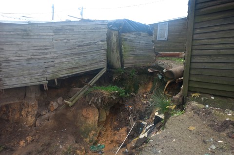 George informal settlement housing risks collapse on unstable former mining land