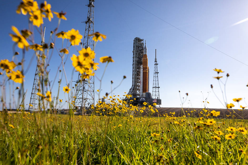 With wildflowers surrounding the view, NASA’s Space Launch System (SLS) Moon rocket – carried atop the Crawler-Transporter 2 – arrives at Launch Pad 39B at the agency’s Kennedy Space Center in Florida on June 6, 2022. The first in an increasingly complex series of missions, Artemis I will test the SLS rocket and Orion spacecraft as an integrated system prior to crewed flights to the Moon. Through Artemis, NASA will land the first woman and first person of color on the lunar surface, paving the way for a long-term lunar presence and using the Moon as a steppingstone before venturing to Mars. Read more about the Artemis I mission. 