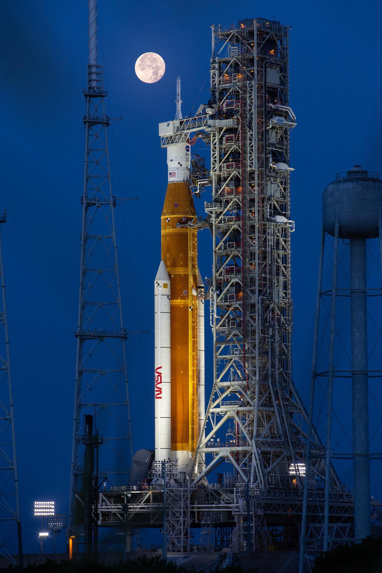 Full Moon over Artemis-1 on July 14, 2022, as the integrated Space Launch System and Orion spacecraft await testing.