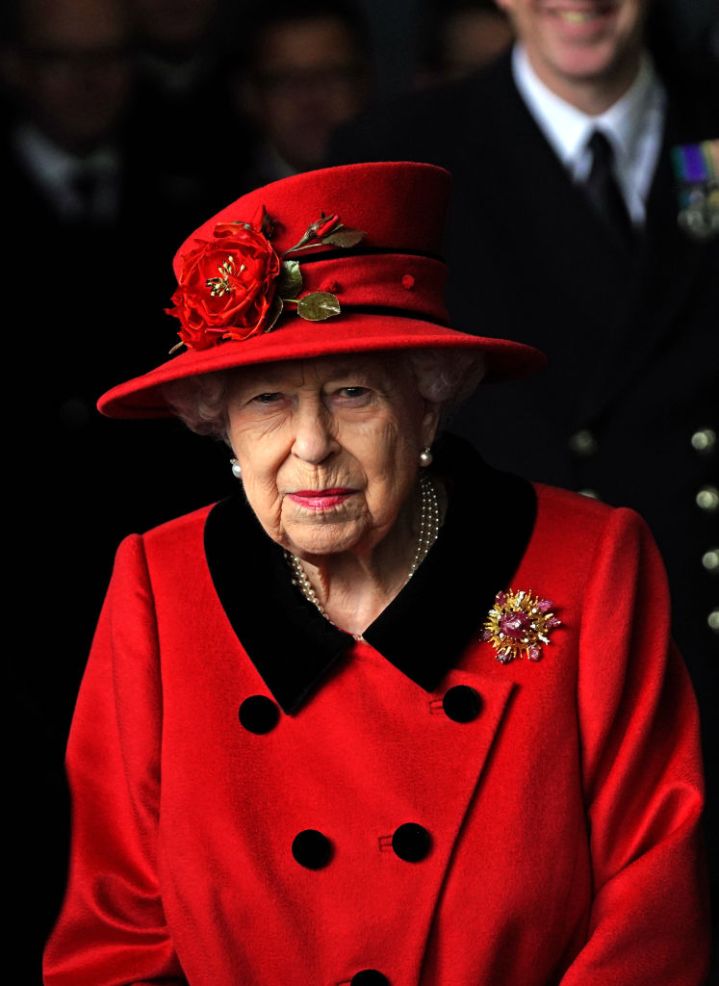 PORTSMOUTH, ENGLAND - MAY 22: Queen Elizabeth II during a visit to HMS Queen Elizabeth at HM Naval Base ahead of the ship's maiden deployment on May 22, 2021 in Portsmouth, England. The visit comes as HMS Queen Elizabeth prepares to lead the UK Carrier Strike Group on a 28-week operational deployment travelling over 26,000 nautical miles from the Mediterranean to the Philippine Sea. (Photo by Steve Parsons - WPA Pool / Getty Images)