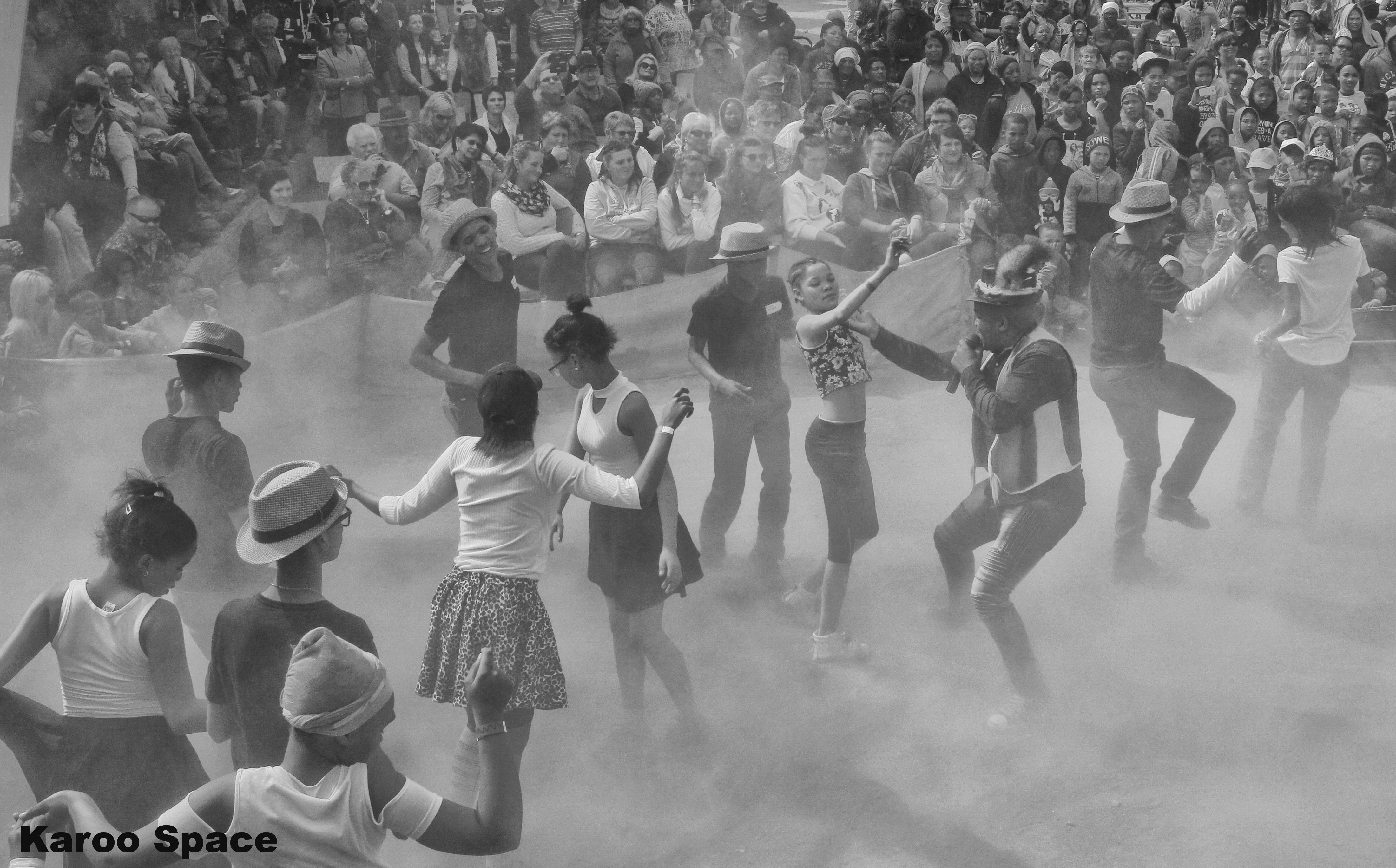 Boeta Gammie riel-dancing with the performers – Williston Winter Festival, Spring 2018. Karoo Roads III Photo Essay