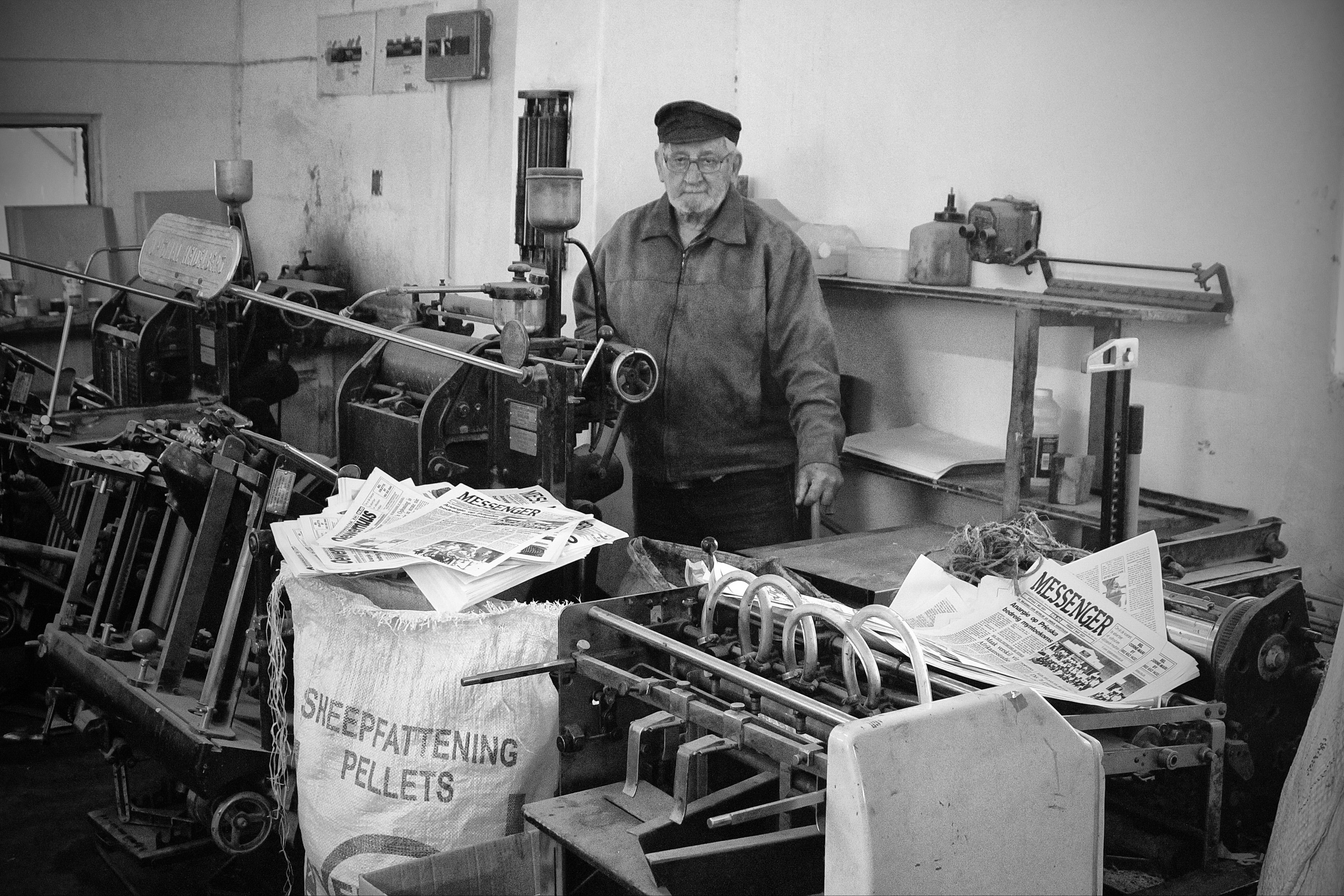 Frans Hugo busy in his print shop.