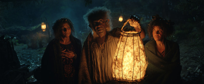 Lenny Henry as Harfoot elder Sadoc Burrows, Thusitha Jayasundera as Malva, and Maxine Cunliffe as Vilma in ‘The Lord of the Rings: The Rings of Power’. Image: courtesy of Amazon Studios