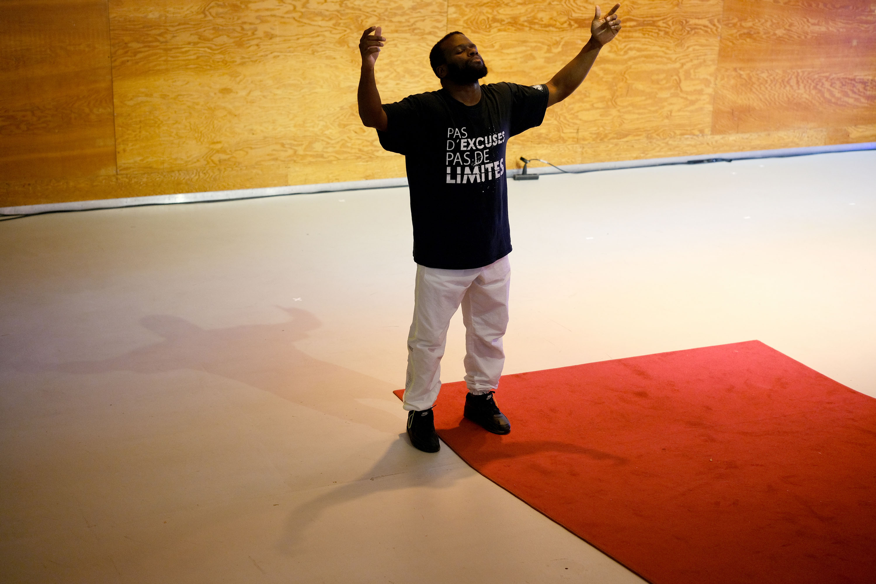 Babacar Cissé performs an excerpt of dance, music and performance from ‘La Derniere Danse du Monarque’ by Cissé and Germaine Acogny (who was present on video projection for the theatre performances). Image: John Hogg