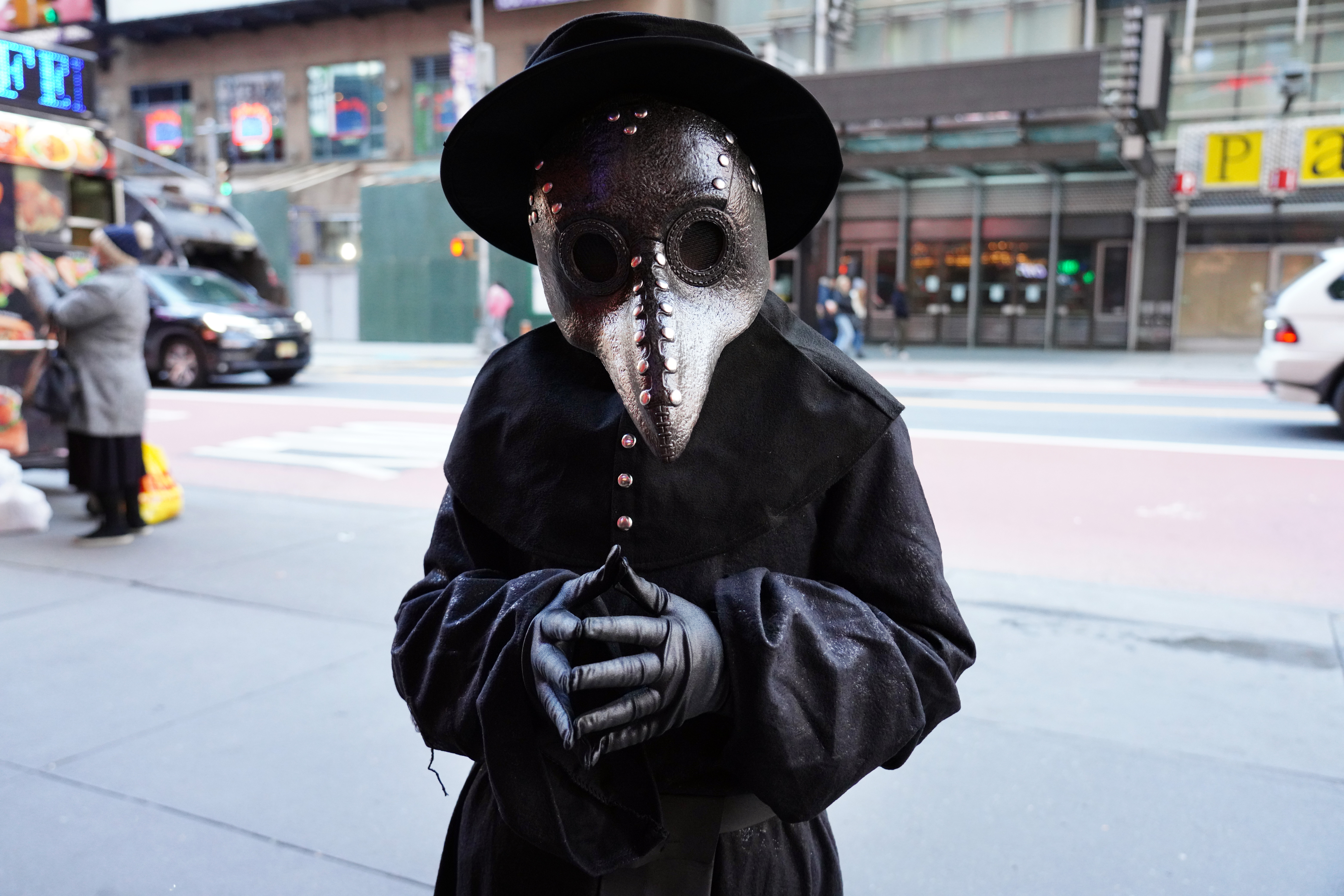 A person wears a plague doctor costume on October 31, 2020 in New York City. Many Halloween events have been canceled or adjusted with additional safety measures due to the ongoing coronavirus (COVID-19) pandemic. (Photo by Cindy Ord/Getty Images)