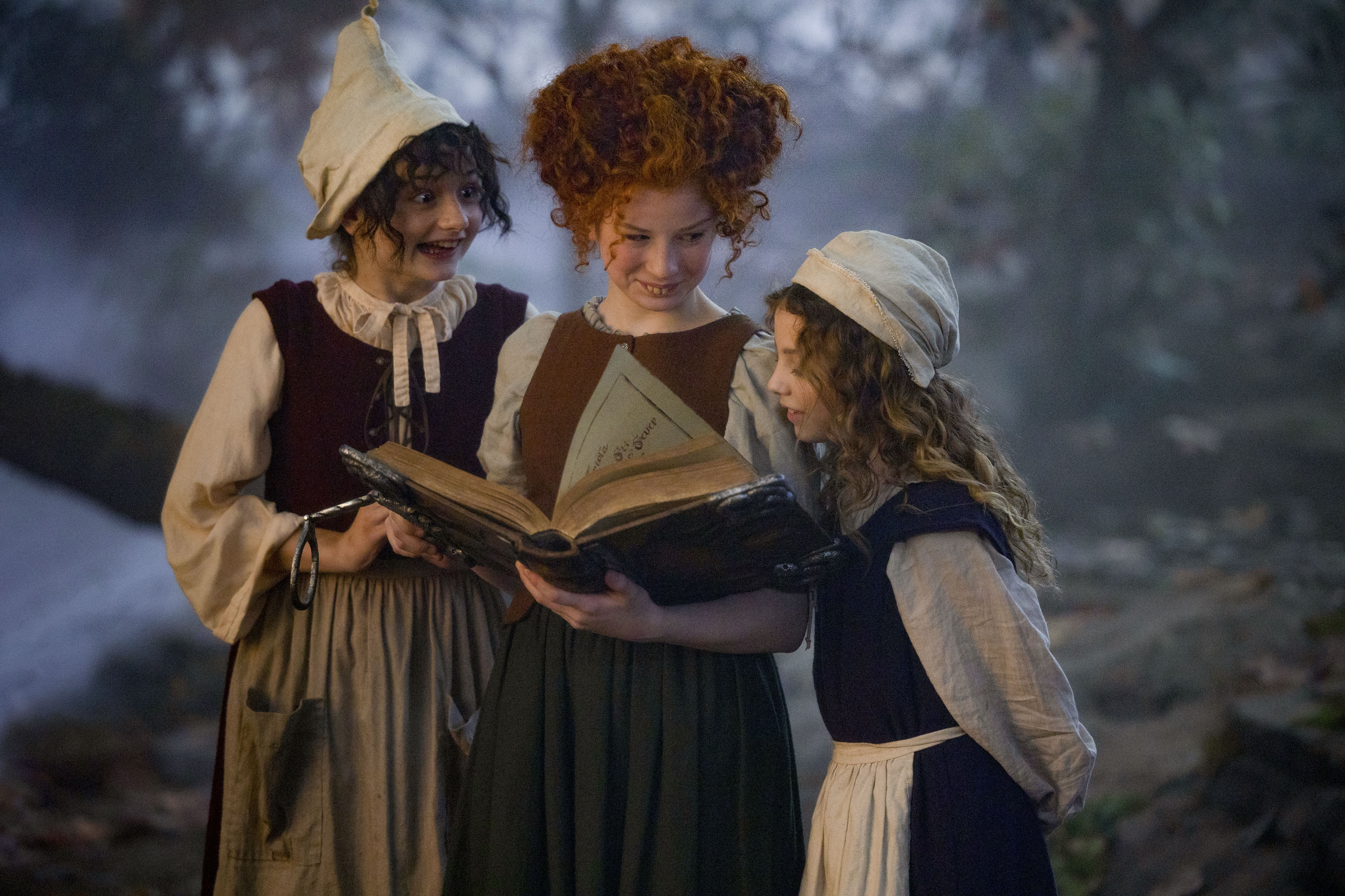 (L-R): Nina Kitchen as Young Mary, Taylor Henderson as Young Winifred, and Juju Brener as Young Sarah in HOCUS POCUS 2, exclusively on Disney+. Photo by Matt Kennedy. © 2022 Disney Enterprises, Inc. All Rights Reserved.