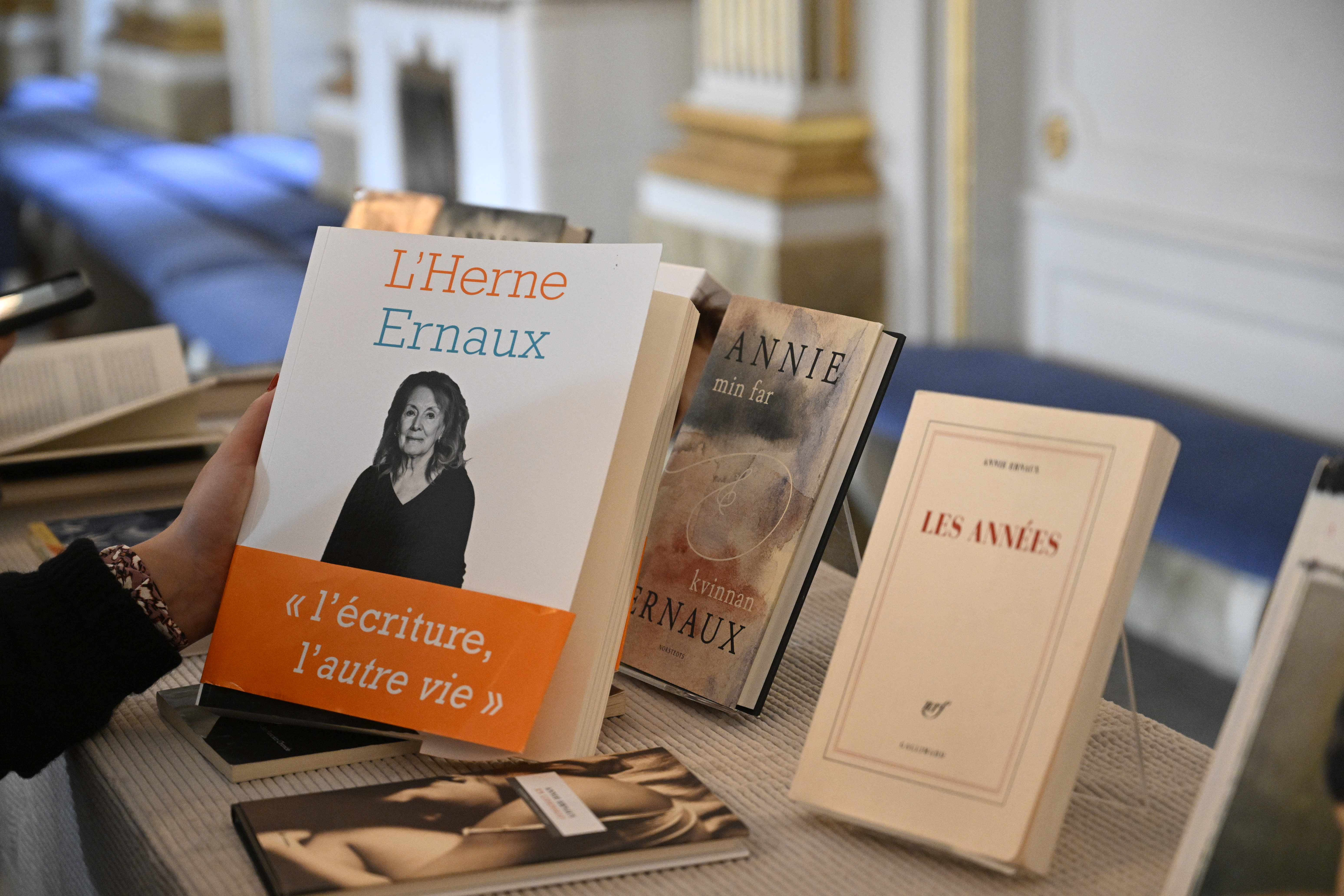  Books by French author Annie Ernaux sit on a table during the announcement of the 2022 Nobel Prize in Literature in Borshuset in Stockholm, Sweden, 06 October 2022. EPA-EFE/Henrik Montgomery 