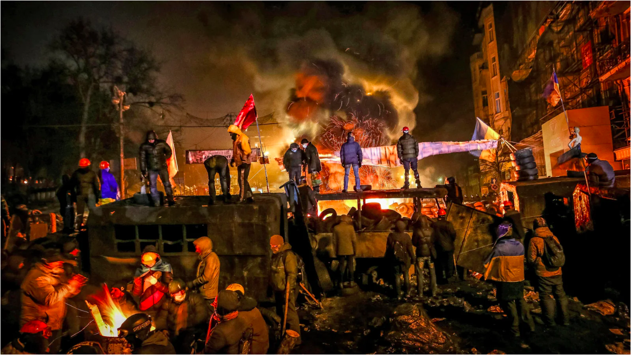 Protesters on a barricade. Production still from ‘Winter On Fire: Ukraine’s Fight For Freedom’. Image: courtesy of Netflix