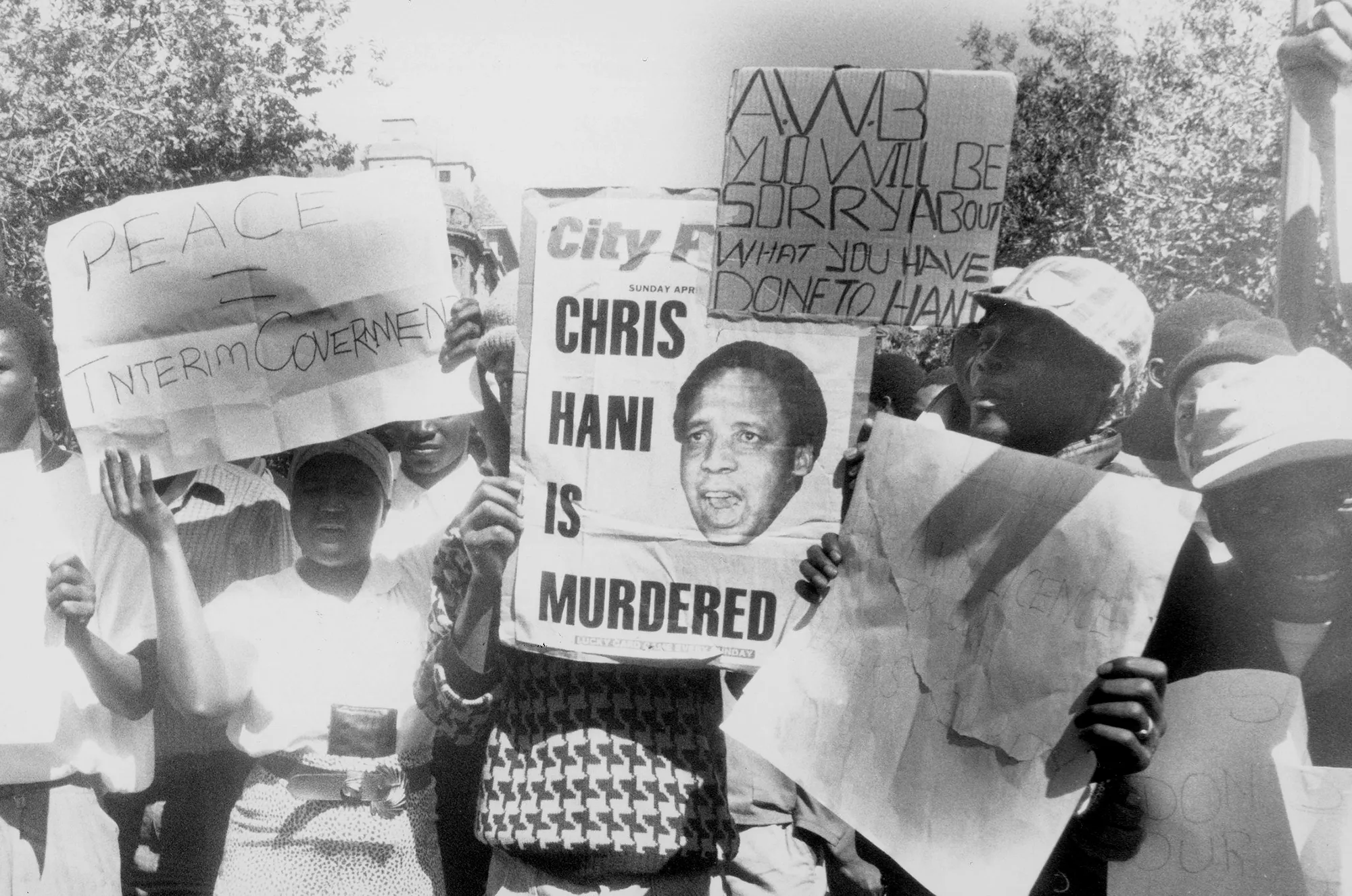 Protestors march through the streets after Chris Hani's assassination