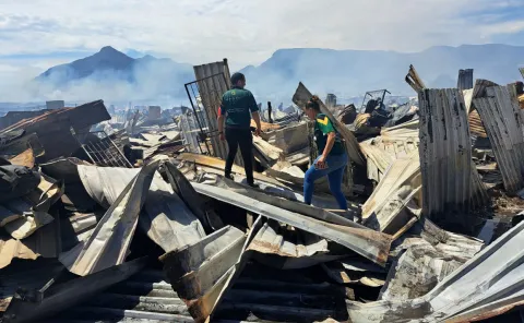Fire rages in Masiphumelele – the second blaze in a month