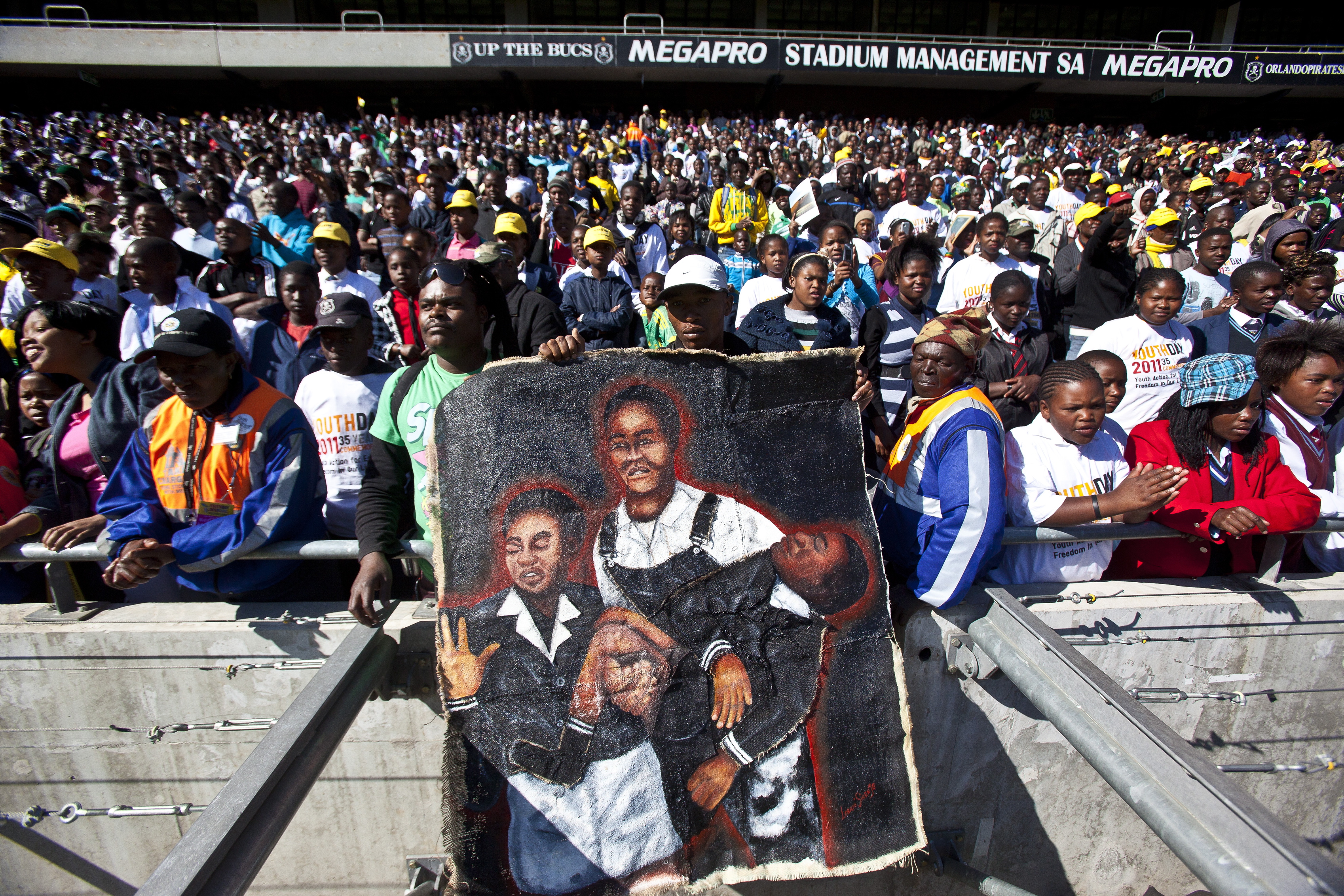 SOWETO, SOUTH AFRICA - JUNE 16: Crowds gathered at the Orlando Stadium for the Youth Day celebrations on June 16, 2011 in Soweto, Johannesburg, South Africa..  (Photo by Gallo Images/The Times/Halden Krog)