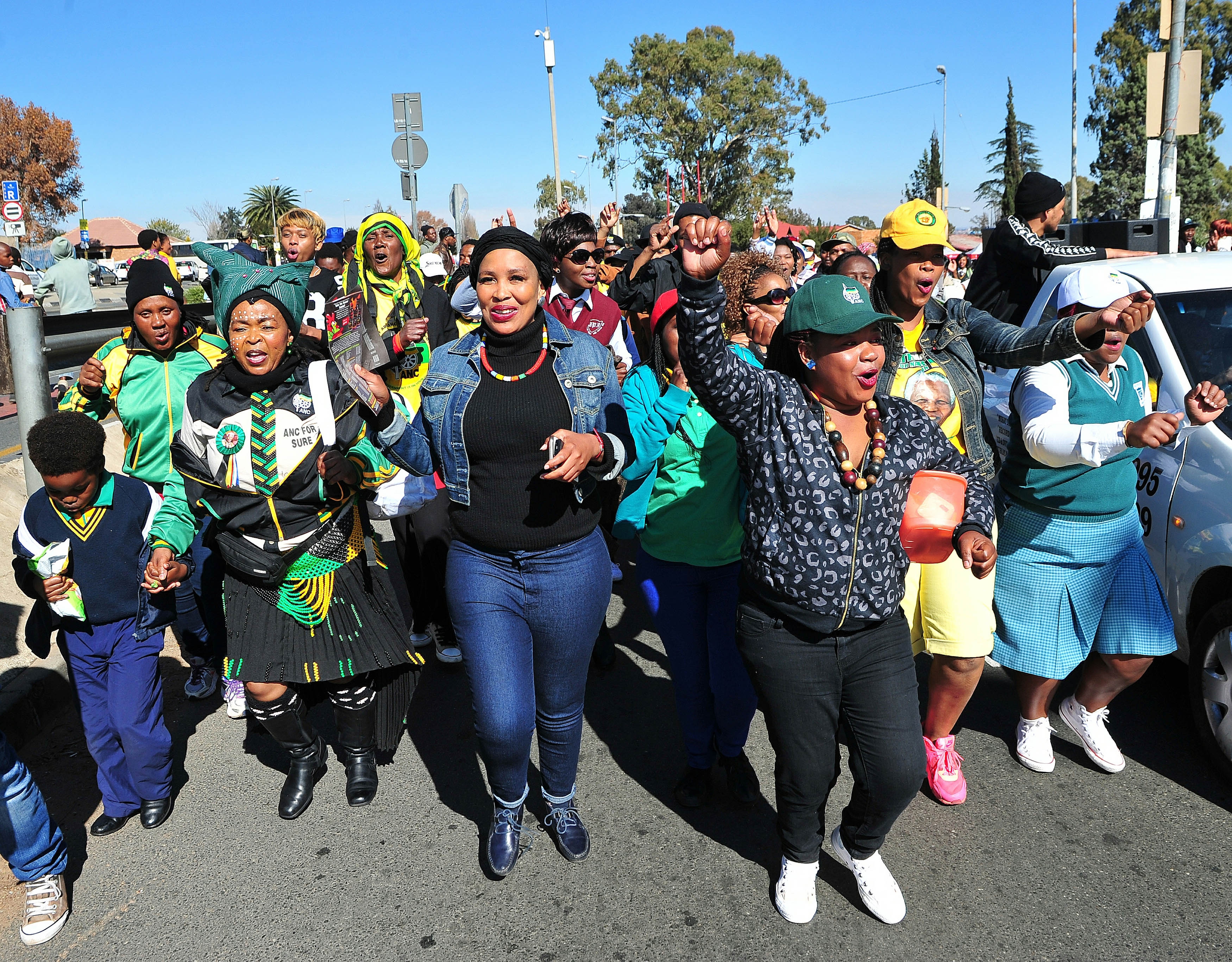 SOWETO, SOUTH AFRICA  JUNE 16: People march to the national commemoration of the 40th anniversary for the June 16, 1976 uprising at Orlando Stadium on June 16, 2016 in Johannesburg, South Africa. Speaking at the event, President Jacob Zuma appealed to young people to stop violent protests and the looting of infrastructure. (Photo by Gallo Images / Sowetan / Veli Nhlapho)