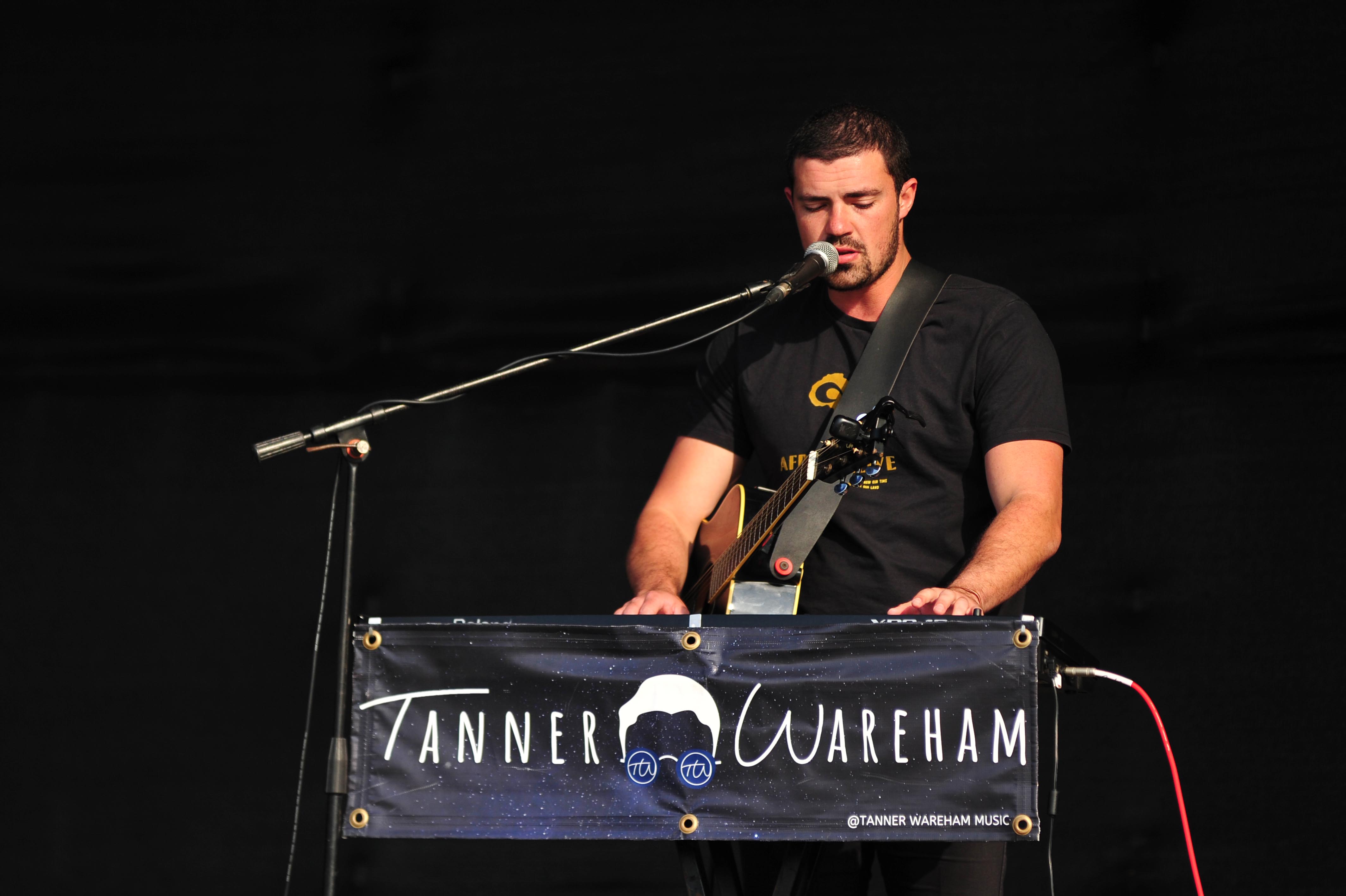 DURBAN, SOUTH AFRICA - AUGUST 05: Tanner Wareham perform on August 5, 2021 in Durban, South Africa. It is reported that the Sharks recently launched #handsofhope campaign that seeks to rebuild the province following the civil unrest and also partnered with KZN's number 1 hit music station, East Coast Radio, to the rebuild team for phase 2 of this upliftment project. (Photo by Gallo Images/Darren Stewart)