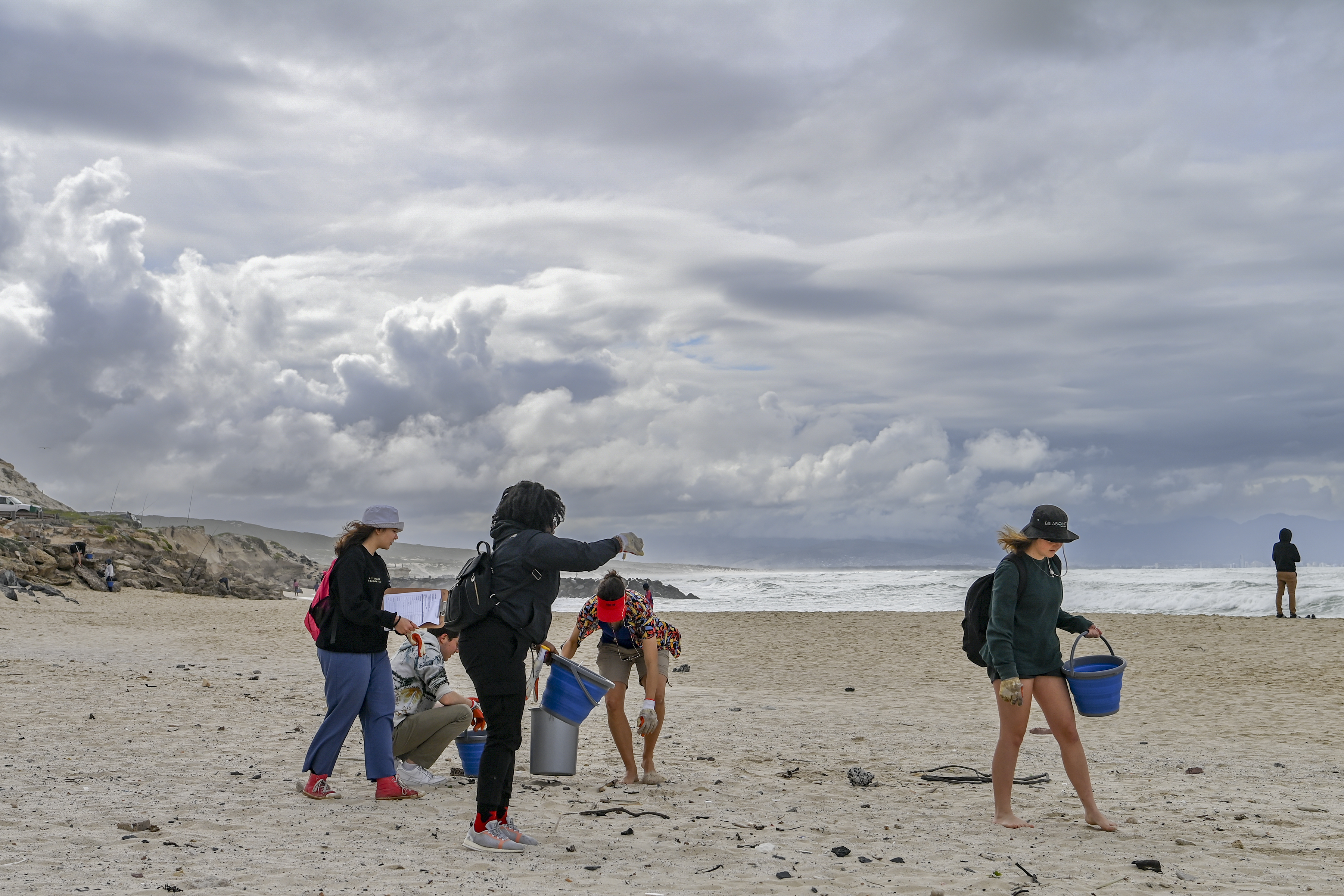 CAPE TOWN, SOUTH AFRICA  SEPTEMBER 17: Volunteers in collaboration with the Two Oceans Aquarium take part in a clean up campaign at Monwabisi Beach as part of the International Coast Cleaning Day on September 17, 2022 in Cape Town, South Africa. Volunteers removed plastics and other rubbish and made notes on the different types of pollution on the beach. (Photo by Gallo Images/Die Burger/Jaco Marais)