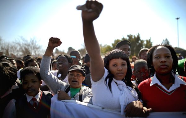 Young people participate in a march to commemorate Youth Day in Soweto