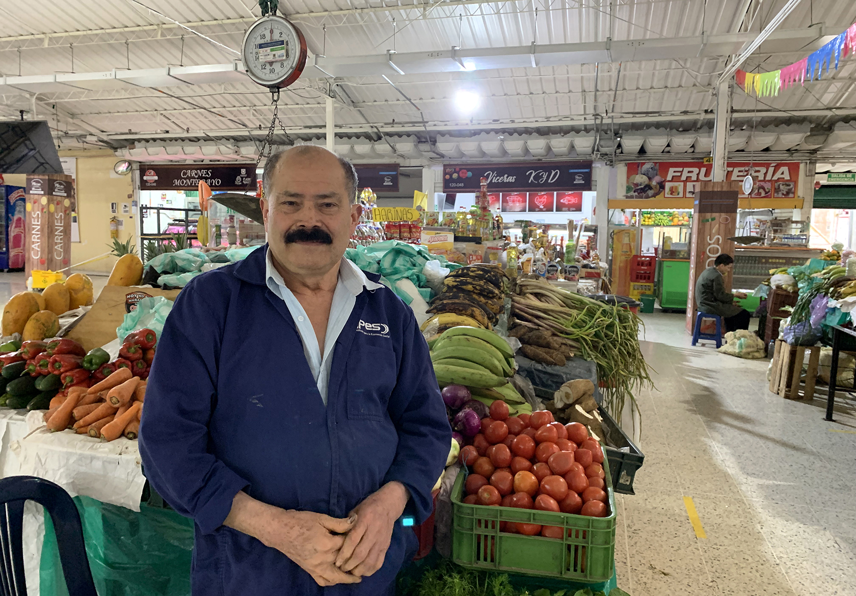 Hernan, a vendor of fresh fruit and vegetables