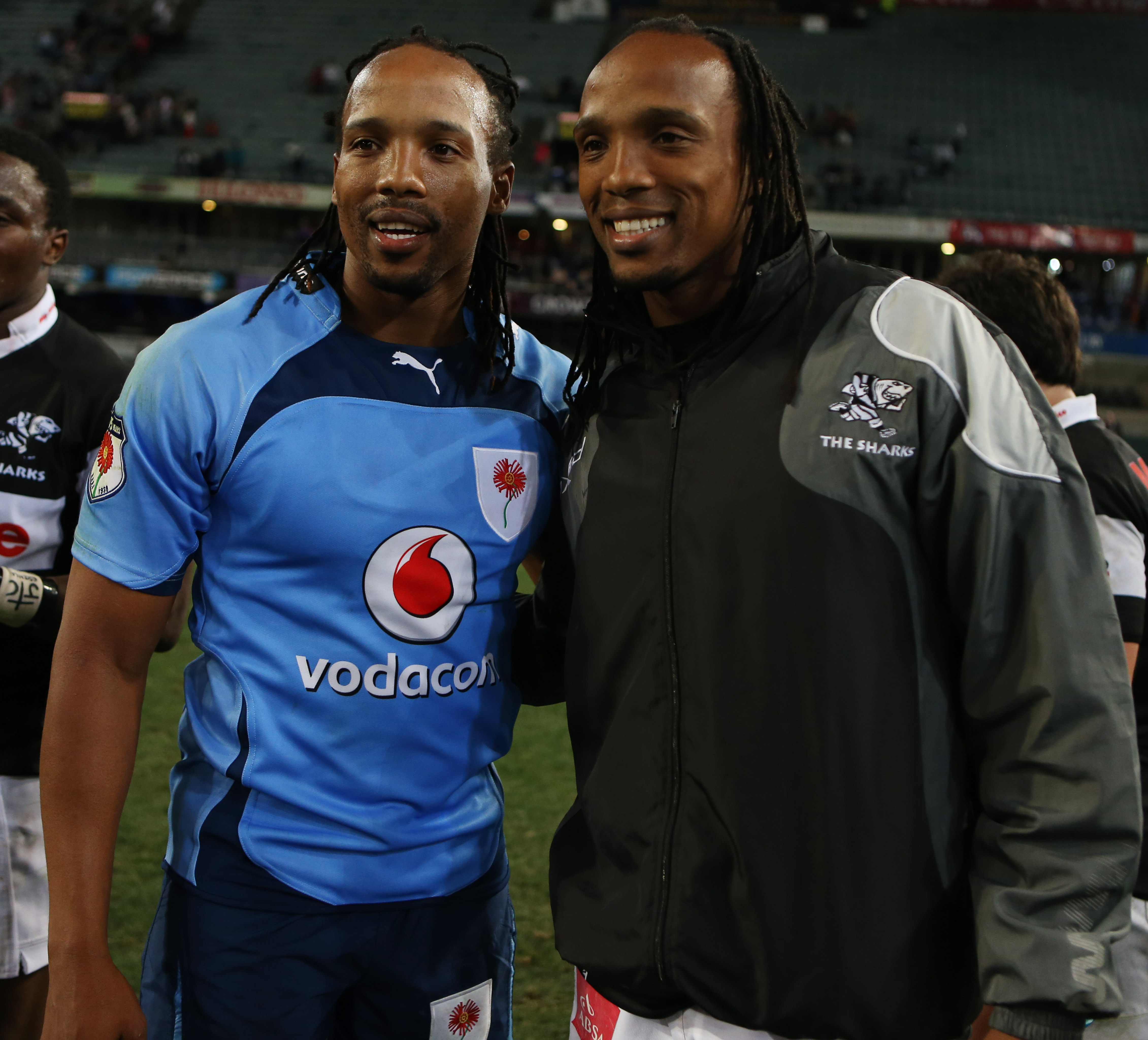 DURBAN, SOUTH AFRICA - AUGUST 31: Akona Ndungane with Odwa Ndunganeu of the Sharks during the Absa Currie Cup match between The Sharks and Vodacom Blue Bulls at Growthpoint Kings Park on August 31, 2013 in Durban, South Africa. (Photo by Steve Haag/Gallo Images)