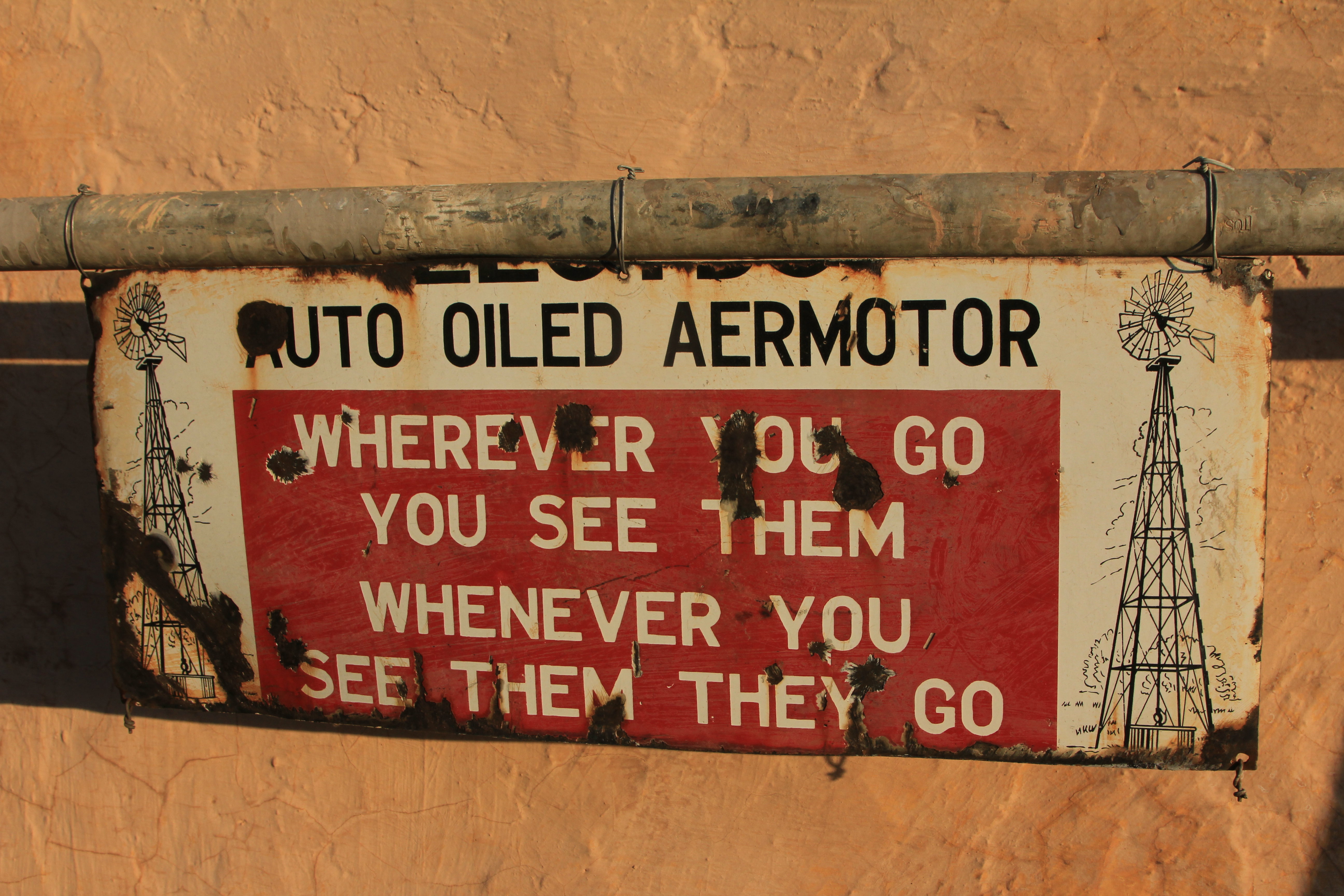The famous Aermotor motto, in ancient enamel on a Karoo farm. Image: Chris Marais